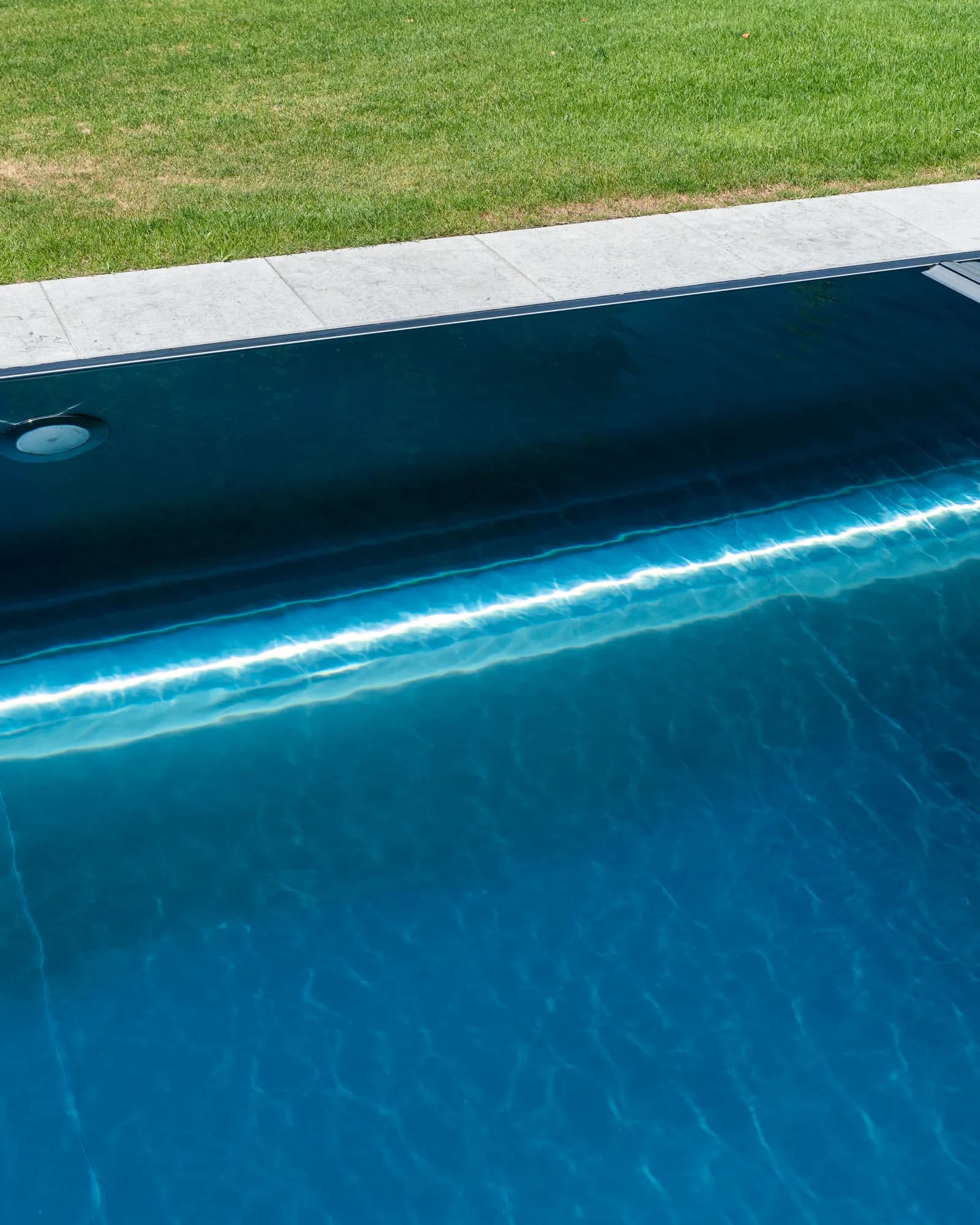 Deep blue pool with automated cover